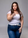 Portrait of funny plus size women with long hair in white t-shir