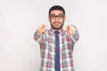 Hey you. portrait of happy bearded businessman in colorful check