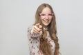 Hey you!You cool! Teenager girl, pointing finger at camera and t Royalty Free Stock Photo