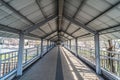 Heysel, Brussels Belgium - Pedestrian tunnel bridge at the Kinepolis movie theaters over the urban metro railway