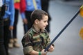 Hezbollah`s child supporter Carries the flag of Hezbollah Royalty Free Stock Photo