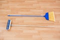 Hgh angle view of long handle brooms