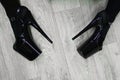 Hhigh boots on platform and heel on the parquet floor during training Royalty Free Stock Photo