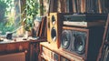 Hi-fi stereo system with large speakers, next to a stack of vinyl records. 80s vintage lifestyles. Close-up Royalty Free Stock Photo