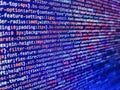 Hi-tech modern screen of data, digits and chars on monitor. Computer script coding source code on desktop monitor. PC software Royalty Free Stock Photo