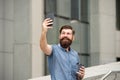 Hi there. Man taking selfie photo smartphone. Streaming online video call. Mobile internet. Tourist capture happy moment Royalty Free Stock Photo