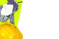 Hi vis vest and hard hat isolated on white background Royalty Free Stock Photo