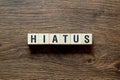 Hiatus - word concept on cubes