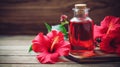 Hibiscus essential oil in a bottle. Generative AI, Royalty Free Stock Photo