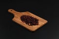 Hibiscus, a pile of red dried Hibiscus tea leaves. Karkade tea. On white background. View from above