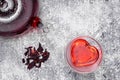 Hibiscus tea in glass teapot and cup Royalty Free Stock Photo