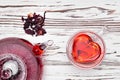 Hibiscus tea in glass teapot and cup Royalty Free Stock Photo