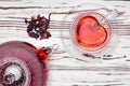 Hibiscus tea in glass teapot and cup Royalty Free Stock Photo