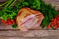 Hickory smoked spiral sliced ham with fresh vegetables Royalty Free Stock Photo