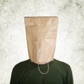 Hidden behind paper bag Royalty Free Stock Photo