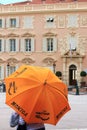 Hidden behind umbrella at Place du Palais, Monaco City