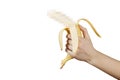 Hidden censored banana in hand on a blue background. Horny aroused penis, male erection and sexual education. Funny pornography