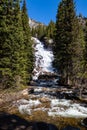 Hidden Falls on Cascade Creek, Grand Teton National Park, Jackson Hole, Wyoming at the end of May Royalty Free Stock Photo