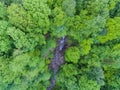 Hidden in the forest waterfall. Aerial top view. Royalty Free Stock Photo