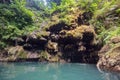 Hidden in jungles Ingkumhan waterfalls, popular tourist attraction in Dimiao, Bohol, Philippines