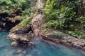 Hidden in jungles Ingkumhan waterfalls, popular tourist attraction in Dimiao, Bohol, Philippines