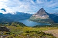 Hidden Lake and pyramid-shaped Bearhat Mountain in Glacier National Park, Montana, USA. Early morning light and scattered clouds Royalty Free Stock Photo