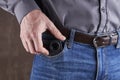 hidden photo or video camera at jeans pocket. harassment and blog concept Royalty Free Stock Photo