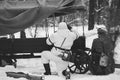 German Wehrmacht Infantry Soldier In World War II Soldiers Sitting In Ambush Near Peasant Cart In Winter Forest And