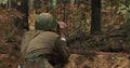 Hidden Re-enactor Dressed Like Russian Soviet Infantry Red Army Soldier In World War II Sitting In Trench Entrenchment