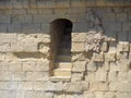 Secret passageway stairwell entrance in stone wall