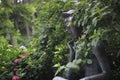 Hidden statue in a beautiful garden in Taejongdae, Busan, South Korea Royalty Free Stock Photo