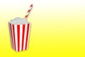 Hidden sugar in food and soft drinks, beverages, a popcorn box full of sugar cristal cubes with a straw on yellow gradient