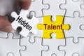 Hidden talent text on missing jigsaw puzzle. Business idea concept Royalty Free Stock Photo