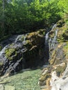 Hidden waterfall in the alps Royalty Free Stock Photo