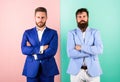 Hide real emotions. Business partners or boss and employee in suits with tense faces. Businessmen with stylish Royalty Free Stock Photo