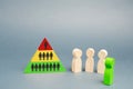 Hierarchical pyramid and wooden figures of people. The concept of the organizational structure of the company or the financial Royalty Free Stock Photo