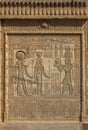 Hieroglyphic carvings in ancient egyptian temple