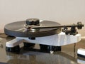 HiFi turntable with vinyl record.