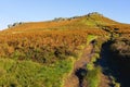 Narrow footpath up to the top of Higger Tor, Derbyshire, on a bright autumn morning Royalty Free Stock Photo