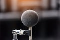 High accuracy microphone in noise sound testing room with LED light bokeh. High technology. Microphone for noise recorder. Royalty Free Stock Photo