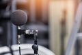 High accuracy microphone in noise sound testing room with LED light bokeh. High technology. Microphone for noise recorder. Royalty Free Stock Photo