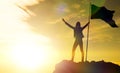 High achievement, silhouettes of the girl, flag of victory on the top Royalty Free Stock Photo