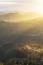 High aerial view sunrise with white fog in early morning at doi Mae salong village Chiang Rai, Thailand Royalty Free Stock Photo