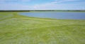 High aerial view tremendous landscape with lake and fields