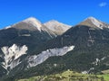 High alpine peaks Piz Linard (2767 m), Lenzerhorn (2906 m) and Piz Mulain (2627 m) Royalty Free Stock Photo