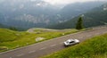 High alpine road with car