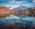 High Alps mountain feflected in cflm water of Chesery lake/Lac De Chesery, Chamonix location. Nice outdoor scene of Vallon de Bera