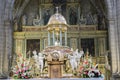 High altar, center of the presbyterate, tabernacle bordered by f
