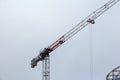 High-altitude crane. grey sky Royalty Free Stock Photo