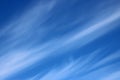 High altitude streaky white clouds in blue sky Royalty Free Stock Photo